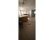 Open-concept dining area with wood flooring, natural light, and a functional layout at 1208 44Th Avenue E Dr, Ellenton, FL 34222