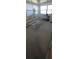 Cozy living area with a floral sofa and a large window at 1208 44Th Avenue E Dr, Ellenton, FL 34222