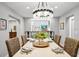 Elegant dining room with chandelier and large table at 1954 Datura St, Sarasota, FL 34239