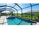 Inviting screened pool and spa area, perfect for relaxation at 4906 Lighthouse Bay Ln, Bradenton, FL 34211