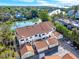 Aerial view of waterfront property with private boat slips and lush landscaping at 862 Hudson Ave # 862, Sarasota, FL 34236