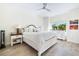 Charming bedroom with white furniture and large window at 862 Hudson Ave # 862, Sarasota, FL 34236