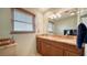 Clean bathroom with granite countertops and double sinks at 1080 Piedmont Rd, Venice, FL 34293