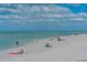 Relaxing beach scene with people enjoying the day at 1080 Piedmont Rd, Venice, FL 34293
