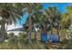 Venice Beach park sign with palm trees at 1080 Piedmont Rd, Venice, FL 34293