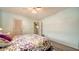 Light and airy bedroom with wood flooring and ceiling fan at 1080 Piedmont Rd, Venice, FL 34293