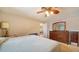 Spacious bedroom with ceiling fan and ample closet space at 1080 Piedmont Rd, Venice, FL 34293