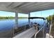 View from the ferry dock, showcasing calm waters and lush vegetation at 1080 Piedmont Rd, Venice, FL 34293