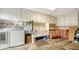 Bright laundry room with washer, dryer, and utility sink at 1080 Piedmont Rd, Venice, FL 34293
