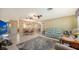 Spacious living area with comfortable furniture and a view into the dining area and kitchen at 1080 Piedmont Rd, Venice, FL 34293