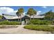 Community park building with palm trees and landscaping at 1080 Piedmont Rd, Venice, FL 34293