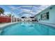Refreshing screened pool with ample seating and patio space at 1080 Piedmont Rd, Venice, FL 34293
