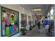 Venice Avenue shopping area with pedestrians and small dog at 1080 Piedmont Rd, Venice, FL 34293
