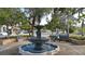 Charming town square featuring a fountain and benches at 1080 Piedmont Rd, Venice, FL 34293