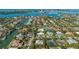 Charming neighborhood aerial view showcasing lush landscaping and beautiful homes at 435 Partridge Cir, Sarasota, FL 34236
