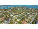 Scenic aerial view of a quiet residential neighborhood with mature trees at 435 Partridge Cir, Sarasota, FL 34236