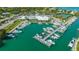 Panoramic aerial view of a marina filled with luxury yachts and waterfront amenities at 435 Partridge Cir, Sarasota, FL 34236