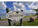 Welcoming sign for Bird Key Park with scenic water views in the background at 435 Partridge Cir, Sarasota, FL 34236