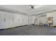 Spacious garage equipped with ample storage cabinets, a sink, and a well-organized layout at 435 Partridge Cir, Sarasota, FL 34236