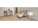 Comfortable living room with a desk, chair, and ottoman, perfect for relaxation and work at 435 Partridge Cir, Sarasota, FL 34236