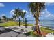 Beautiful park view with palm trees, bike racks, and waterfront scenery at 435 Partridge Cir, Sarasota, FL 34236