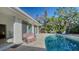 Inviting pool area with comfortable seating, perfect for enjoying sunny days and outdoor relaxation at 435 Partridge Cir, Sarasota, FL 34236