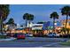 Charming street view lined with vibrant shops, palm trees, and parked cars, perfect for browsing and enjoying the scenery at 435 Partridge Cir, Sarasota, FL 34236