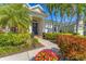 Elegant front door with a wreath and flanking planters at 8123 8Th Nw Ter, Bradenton, FL 34209