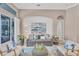 Cozy living room with gray sofa and glass-top coffee table at 8123 8Th Nw Ter, Bradenton, FL 34209