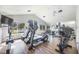 Bright community gym with an array of modern exercise equipment and floor to ceiling mirrors at 11120 Sanctuary Dr, Bradenton, FL 34209