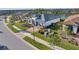 Aerial view of neighborhood with houses and palm trees at 13005 Rinella St, Venice, FL 34293