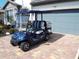 Blue golf cart parked in front of a house at 13005 Rinella St, Venice, FL 34293