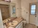 Clean bathroom featuring a tub, toilet and vanity at 25692 Aysen Dr, Punta Gorda, FL 33983