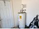 Water heater located in the garage at 25692 Aysen Dr, Punta Gorda, FL 33983