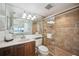 Clean bathroom with shower, toilet and vanity at 6140 Midnight Pass Rd # 407, Sarasota, FL 34242