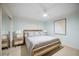 King size bed and dresser in a nicely decorated bedroom at 6140 Midnight Pass Rd # 407, Sarasota, FL 34242