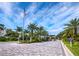 Private gated entrance to exclusive community at 65 Lighthouse Point Dr, Longboat Key, FL 34228