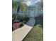 Updated home exterior with walkway and landscaping at 6725 Roxbury Dr, Sarasota, FL 34231