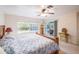 Spacious bedroom with sliding door to the pool area and dresser at 1496 Palm View Rd, Sarasota, FL 34240