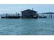 Small building on a floating dock in the water at 4420 119Th W St, Cortez, FL 34215
