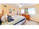 Bedroom with wood bed frame and wood dresser at 2910 49Th St, Sarasota, FL 34234