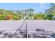 Private tennis court with view of guest house at 2910 49Th St, Sarasota, FL 34234