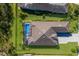 Directly above view of house and backyard pool at 9908 Carnoustie Pl, Bradenton, FL 34211