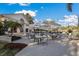 Relaxing outdoor patio with umbrellas and tables at 9908 Carnoustie Pl, Bradenton, FL 34211