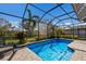 Inviting screened pool area with a spacious patio at 9908 Carnoustie Pl, Bradenton, FL 34211