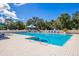 Inviting swimming pool with lounge chairs at 9908 Carnoustie Pl, Bradenton, FL 34211