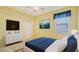 Virtually staged bedroom featuring a comfortable bed and plenty of storage at 10643 Old Grove Cir, Bradenton, FL 34212