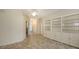 Bright entryway with built-in shelving at 10643 Old Grove Cir, Bradenton, FL 34212