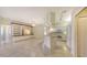 Kitchen with island and white cabinets at 10643 Old Grove Cir, Bradenton, FL 34212