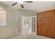 Home office with built-in shelving and cabinets at 10643 Old Grove Cir, Bradenton, FL 34212